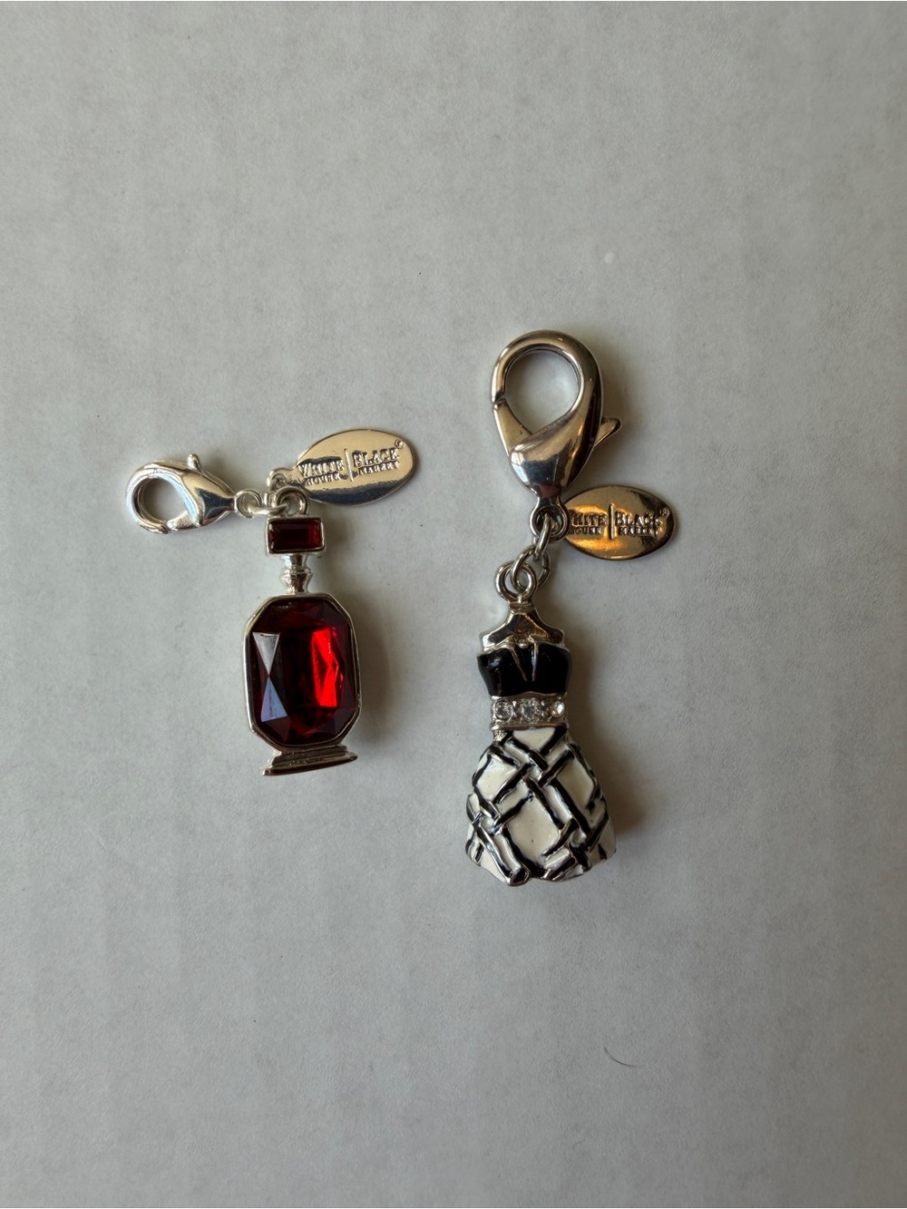 White House Black Market dress and red perfume bottle keychain